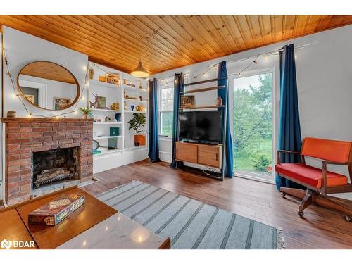 856 Miller Road, Picton, ON - Indoor Photo Showing Living Room With Fireplace