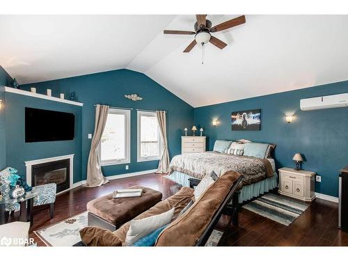 2776 Ireton Street, Innisfil, ON - Indoor Photo Showing Bedroom With Fireplace