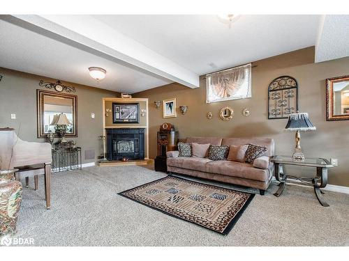 2776 Ireton Street, Innisfil, ON - Indoor Photo Showing Living Room With Fireplace