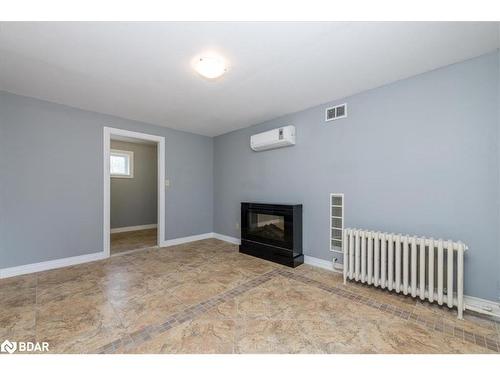 46 Eugenia Street, Barrie, ON - Indoor With Fireplace