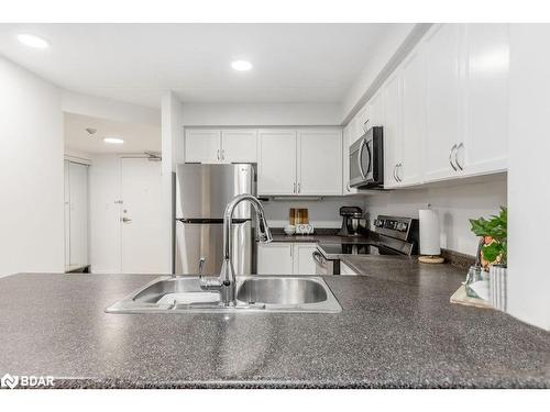 213-486 Laclie Street, Orillia, ON - Indoor Photo Showing Kitchen With Double Sink