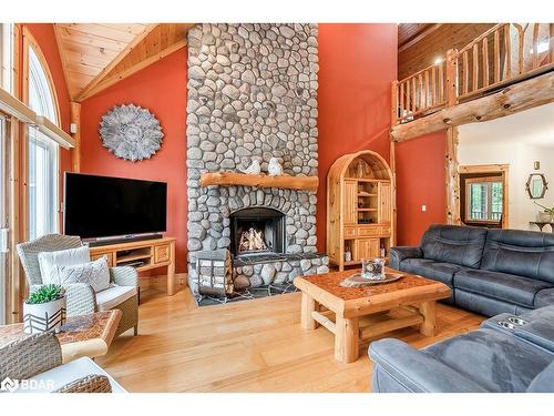 697 Lafontaine Road E, Tiny, ON - Indoor Photo Showing Living Room With Fireplace