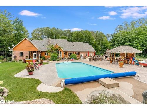 697 Lafontaine Road E, Tiny, ON - Outdoor With In Ground Pool With Backyard