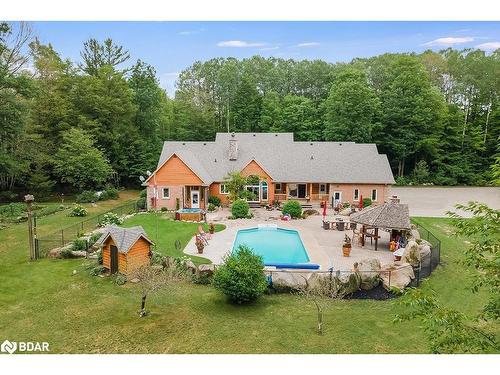 697 Lafontaine Road E, Tiny, ON - Outdoor With In Ground Pool