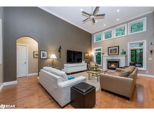 5 Timber Court, Springwater, ON - Indoor Photo Showing Living Room With Fireplace