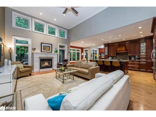 5 Timber Court, Springwater, ON - Indoor Photo Showing Living Room With Fireplace