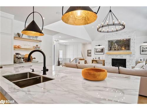 28 Byers St Street, Snow Valley, ON - Indoor Photo Showing Kitchen With Fireplace With Double Sink