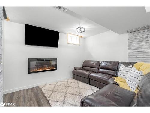 1301 Hunter Street, Innisfil, ON - Indoor Photo Showing Living Room With Fireplace