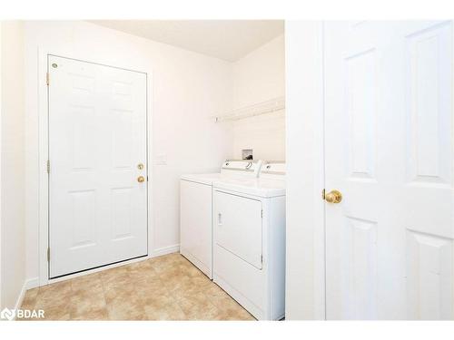 63 Pennsylvania Avenue, Wasaga Beach, ON - Indoor Photo Showing Laundry Room