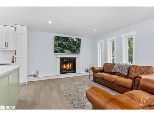 30 Golf Course Road, Bracebridge, ON - Indoor Photo Showing Living Room With Fireplace