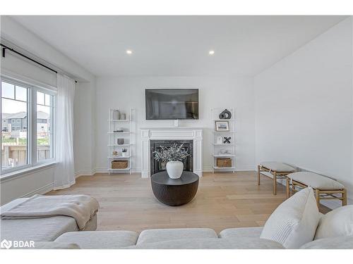 23 Lorne Thomas Place, Alliston, ON - Indoor Photo Showing Living Room With Fireplace