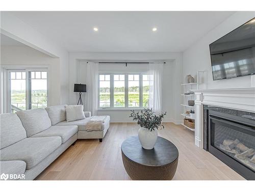 23 Lorne Thomas Place, Alliston, ON - Indoor Photo Showing Living Room With Fireplace