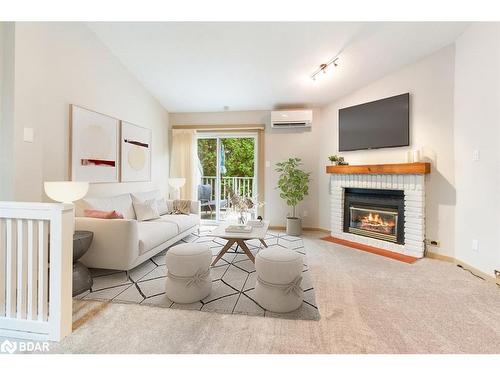 403-12 Dawson Drive, Collingwood, ON - Indoor Photo Showing Living Room With Fireplace