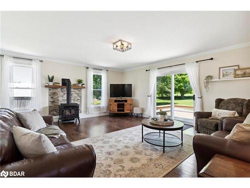 82 Providence Road, Kawartha Lakes, ON - Indoor Photo Showing Living Room With Fireplace