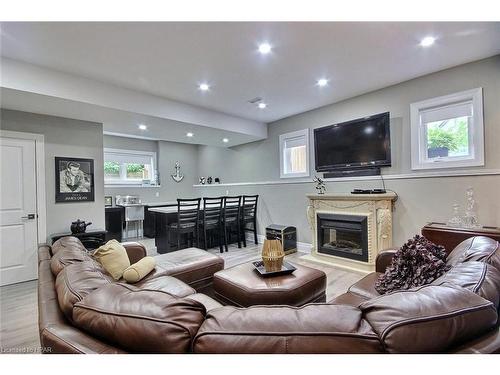 76 Old Mosley Street, Wasaga Beach, ON - Indoor Photo Showing Living Room With Fireplace