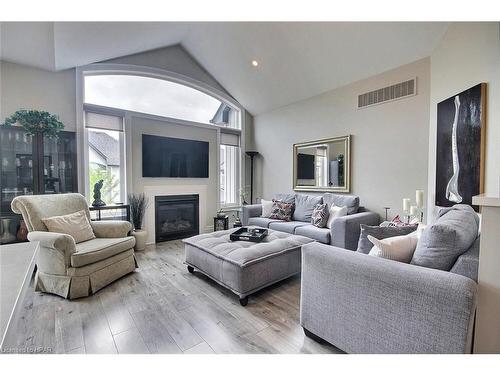 76 Old Mosley Street, Wasaga Beach, ON - Indoor Photo Showing Living Room With Fireplace