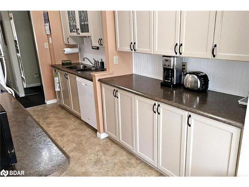 103-54 Fittons Road W, Orillia, ON - Indoor Photo Showing Kitchen With Double Sink