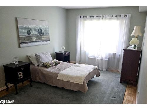 103-54 Fittons Road W, Orillia, ON - Indoor Photo Showing Bedroom