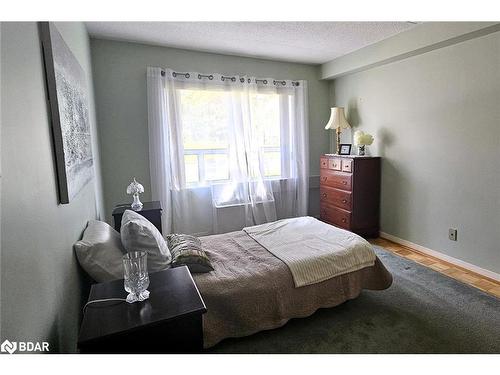 103-54 Fittons Road W, Orillia, ON - Indoor Photo Showing Bedroom