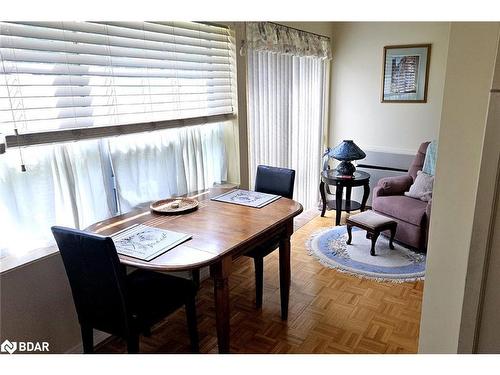 103-54 Fittons Road W, Orillia, ON - Indoor Photo Showing Living Room With Fireplace