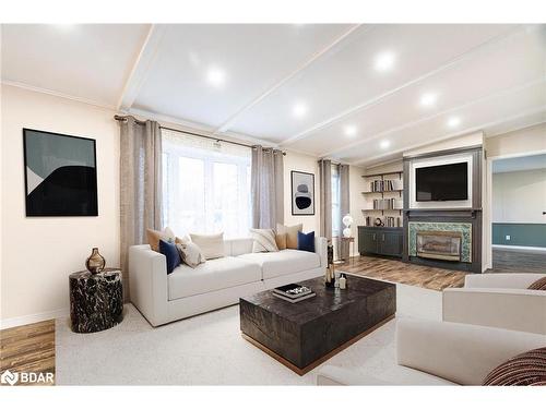 3 Murray Drive, Wasaga Beach, ON - Indoor Photo Showing Living Room With Fireplace