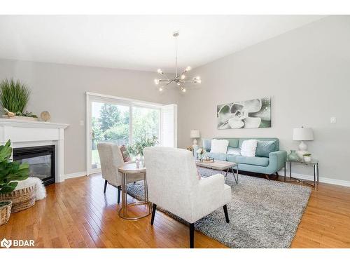 9 Couples Court, Barrie, ON - Indoor Photo Showing Living Room With Fireplace