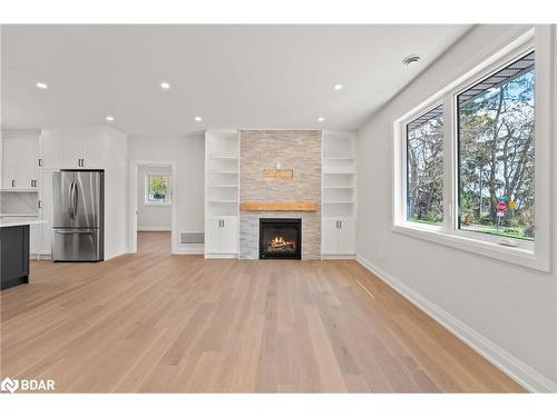 806 Adams Road, Innisfil, ON - Indoor Photo Showing Other Room With Fireplace