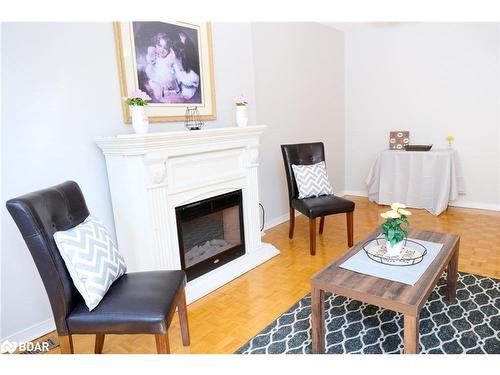 573 Mosley Street, Wasaga Beach, ON - Indoor Photo Showing Living Room With Fireplace