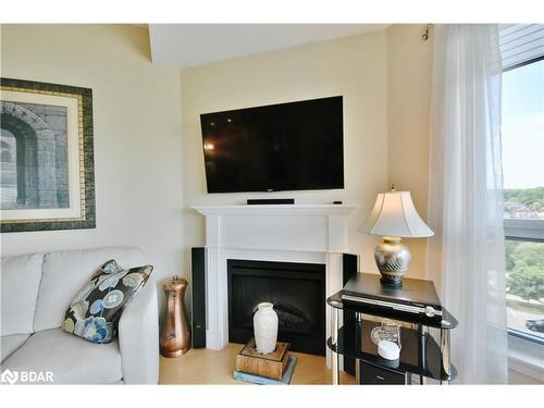 709-6 Toronto Street, Barrie, ON - Indoor Photo Showing Other Room With Fireplace