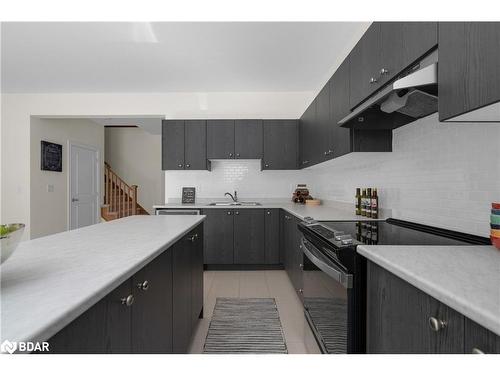 33 Atlantis Drive, Orillia, ON - Indoor Photo Showing Kitchen With Double Sink With Upgraded Kitchen