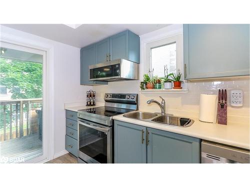 10-119 D'Ambrosio Drive, Barrie, ON - Indoor Photo Showing Kitchen With Double Sink