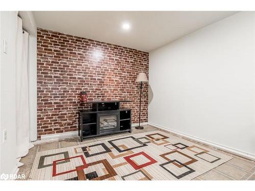 12 Chaucer Crescent, Barrie, ON - Indoor With Fireplace