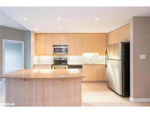 907-33 Ellen Street, Barrie, ON - Indoor Photo Showing Kitchen With Double Sink