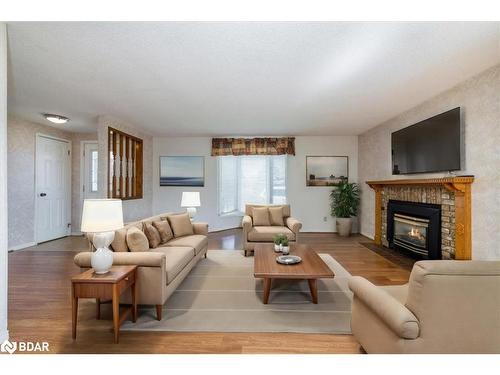 11 Carmans Cove, Innisfil, ON - Indoor Photo Showing Living Room With Fireplace