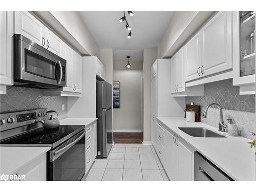 101-306 Essa Road, Barrie, ON - Indoor Photo Showing Kitchen With Stainless Steel Kitchen