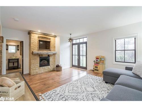 7001 County Road 27, Innisfil, ON - Indoor Photo Showing Living Room With Fireplace