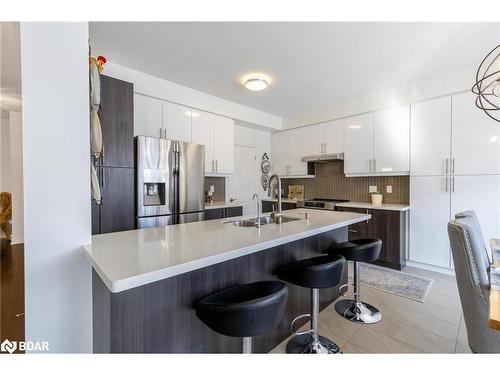 112 Stewart Crescent Crescent, Bradford West Gwillimbury, ON - Indoor Photo Showing Kitchen With Stainless Steel Kitchen With Double Sink With Upgraded Kitchen