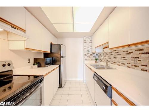 202-65 Ellen Street, Barrie, ON - Indoor Photo Showing Kitchen With Double Sink