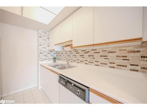 202-65 Ellen Street, Barrie, ON - Indoor Photo Showing Kitchen With Double Sink