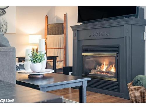 483 Mapleview Drive E, Innisfil, ON - Indoor Photo Showing Living Room With Fireplace