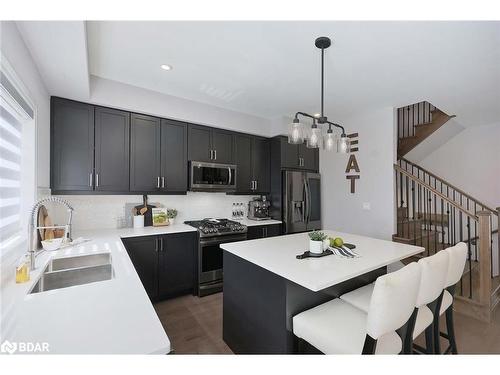 74 Leeson Street N, Grand Valley, ON - Indoor Photo Showing Kitchen With Stainless Steel Kitchen With Double Sink With Upgraded Kitchen