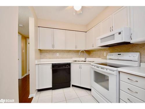 103-25 Meadow Lane, Barrie, ON - Indoor Photo Showing Kitchen With Double Sink