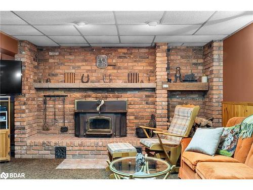 3093 26 Highway, Springwater, ON - Indoor Photo Showing Living Room With Fireplace