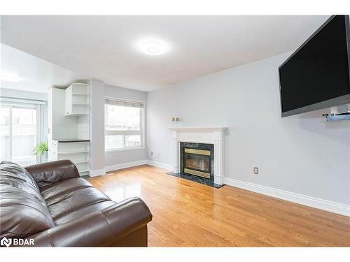1448 Forest Street, Innisfil, ON - Indoor Photo Showing Living Room With Fireplace