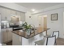 213-4 Spice Way, Barrie, ON  - Indoor Photo Showing Kitchen With Stainless Steel Kitchen 