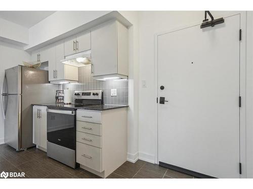 213-4 Spice Way, Barrie, ON - Indoor Photo Showing Kitchen With Stainless Steel Kitchen