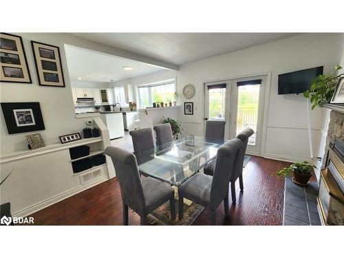 1252 Shore Acres Drive, Gilford, ON - Indoor Photo Showing Dining Room With Fireplace