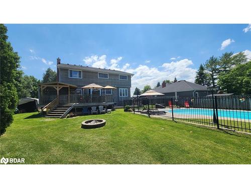 1252 Shore Acres Drive, Gilford, ON - Outdoor With In Ground Pool With Deck Patio Veranda With Backyard