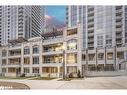 Th01-761 Bay Street, Toronto, ON  - Outdoor With Balcony With Facade 