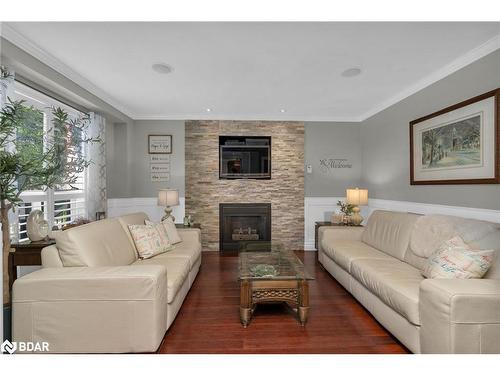 11 Frontier Avenue, Orillia, ON - Indoor Photo Showing Living Room With Fireplace